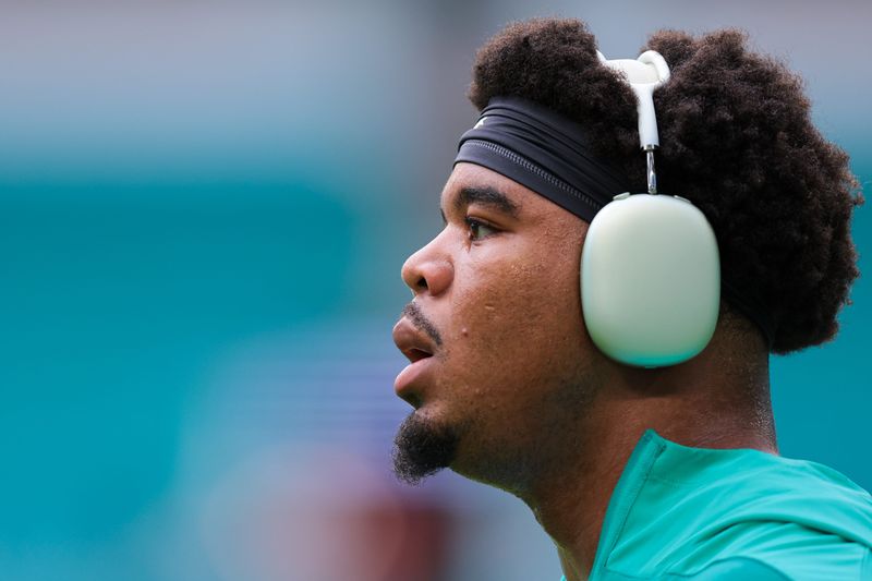 Aug 23, 2025; Miami Gardens, Florida, USA; Miami Dolphins linebacker Chop Robinson (44) looks on before the game against the Jacksonville Jaguars at Hard Rock Stadium. Mandatory Credit: Sam Navarro-Imagn Images