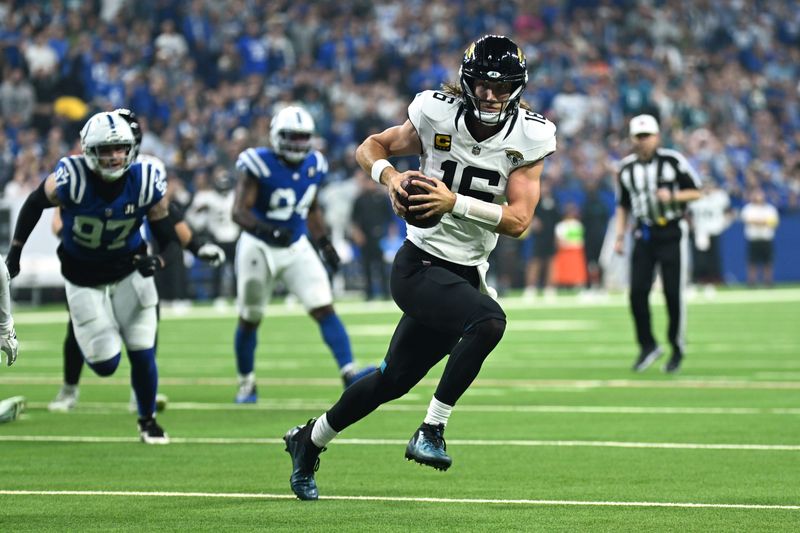 Dec 28, 2025; Indianapolis, Indiana, USA; Jacksonville Jaguars quarterback Trevor Lawrence (16) scores a touchdown against Indianapolis Colts safety Nick Cross (20) during the first half at Lucas Oil Stadium. Mandatory Credit: Robert Goddin-Imagn Images
