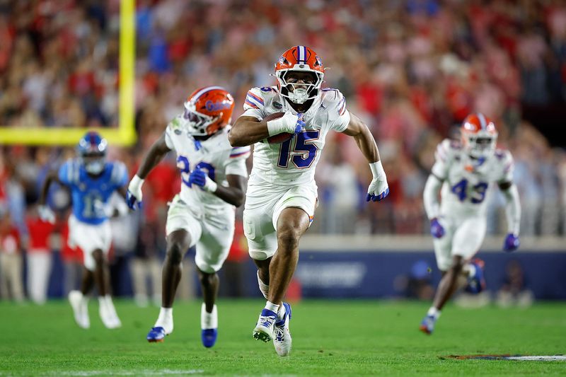OXFORD, MISSISSIPPI - NOVEMBER 15: Jayden Woods #15 of the Florida Gators carries the ball after a interception during the first half against the Mississippi Rebels at Vaught-Hemingway Stadium on November 15, 2025 in Oxford, Mississippi. (Photo by Justin Ford/Getty Images)