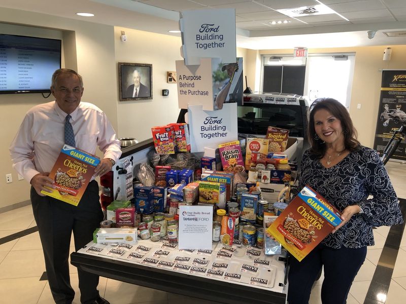 Tim and Sheila Zellers at a Ford food drive.
