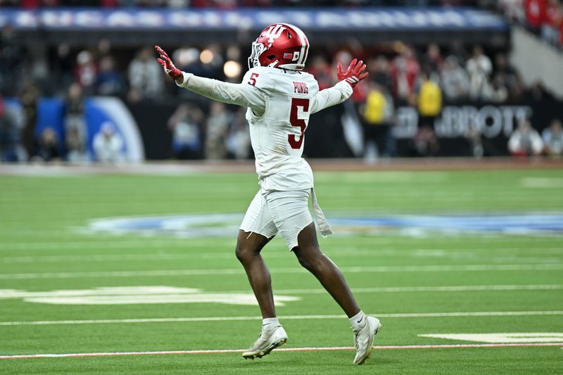 Dec 6, 2025; Indianapolis, IN, USA; Indiana Hoosiers defensive back D'Angelo Ponds (5) celebrates in the second half against the Ohio State Buckeyes during the 2025 Big Ten championship game at Lucas Oil Stadium. Mandatory Credit: Robert Goddin-Imagn Images