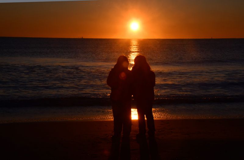 People from all over central Florida come to the beach to watch the first sunrise of the new year. People sat under blankets, stood, sat in chairs to watch the first sunrise just south of the Cocoa Beach Pier.
