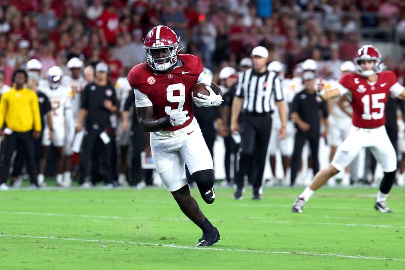 Sep 6, 2025; Tuscaloosa, Alabama, USA; Alabama Crimson Tide running back Richard Young (9) sprints to the endzone for a touchdown during the first quarter against the Louisiana Monroe Warhawks at Saban Field at Bryant-Denny Stadium. Mandatory Credit: David Leong-Imagn Images