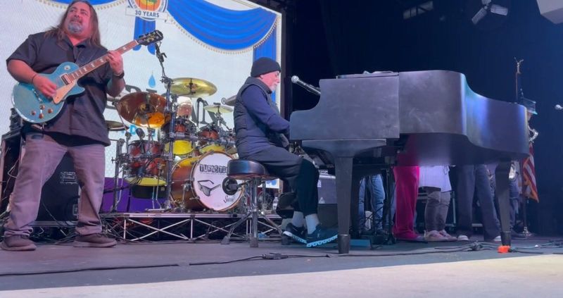 Billy Joel performs on Jan. 2, 2026, at Wellington's birthday bash at the village amphitheater. With him is the band Turnstiles, whose concerts pay tribute to Joel's music.