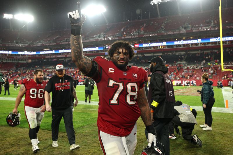 Jan 3, 2026; Tampa, Florida, USA; Tampa Bay Buccaneers offensive tackle Tristan Wirfs (78) celebrates after defeating the Carolina Panthers at Raymond James Stadium. Mandatory Credit: Nathan Ray Seebeck-Imagn Images