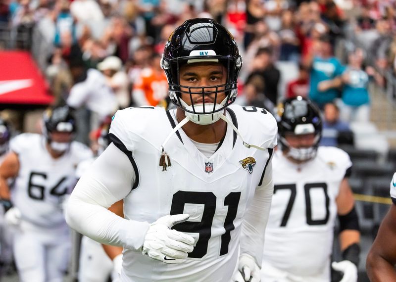 Nov 23, 2025; Glendale, Arizona, USA; Jacksonville Jaguars defensive tackle Arik Armstead (91) against the Arizona Cardinals at State Farm Stadium. Mandatory Credit: Mark J. Rebilas-Imagn Images
