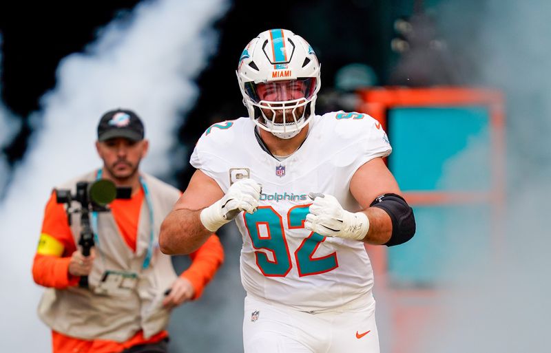 Nov 9, 2025; Miami Gardens, Florida, USA; Miami Dolphins defensive tackle Zach Sieler (92) runs on the field before a game against the Buffalo Bills at Hard Rock Stadium. Mandatory Credit: Jeff Romance-Imagn Images