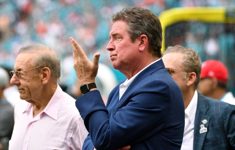 Dolphins owner Stephen Ross, left, and former quarterback Dan Marino, a special advisor to the team, watch forlornly as the Falcons kick a field goal on the final play of the game to defeat Miami Sunday at Hard Rock Stadium. The Dolphins were docked a first-round pick in 2023 and a third-rounder in 2024 and owner Stephen Ross was suspended through mid-October and fined $1.5 million for damage to the integrity of the game, NFL Commissioner Roger Goodell announced Tuesday. The penalties largely surround the DolphinsÃ• flirtation with quarterback Tom Brady Ã‘ not only before the 2021 season when Brady was a member of the Tampa Bay Buccaneers but extending all the way back to the 2019-20 season when he was with the New England Patriots.