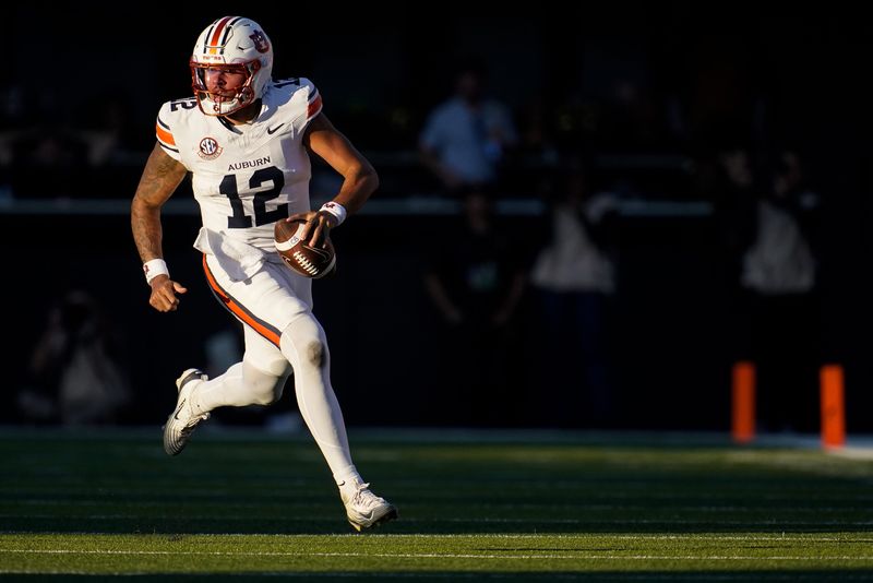 Auburn quarterback Ashton Daniels (12) runs the ball against Vanderbilt on a keeper during the second quarter at FirstBank Stadium in Nashville, Tenn., Saturday, Nov. 8, 2025.