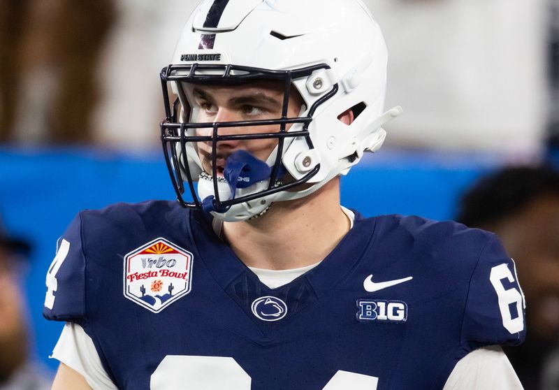 Dec 31, 2024; Glendale, AZ, USA; Penn State Nittany Lions offensive lineman Eagan Boyer (64) against the Boise State Broncos during the Fiesta Bowl at State Farm Stadium. Mandatory Credit: Mark J. Rebilas-Imagn Images