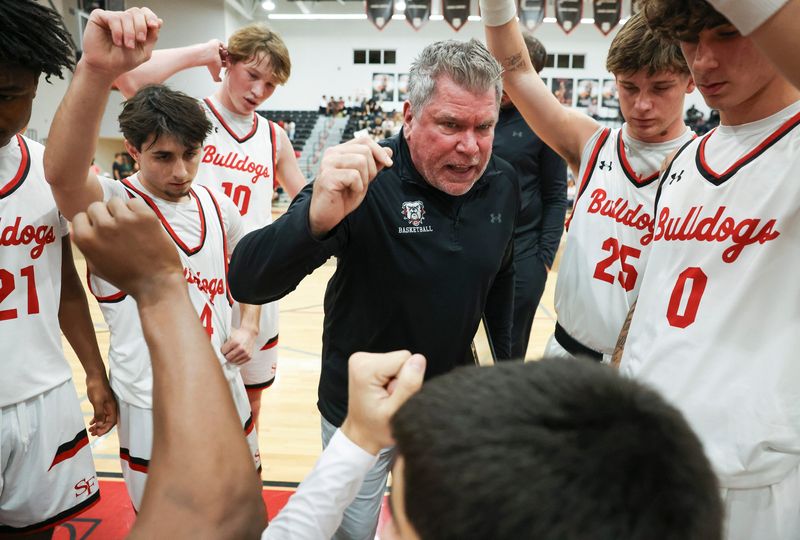 South Fork head coach Brian Flynn with his team at the start of a boys basketball game against Vero Beach, Jan. 8, 2026, in Martin County. Vero Beach won 50-38.
