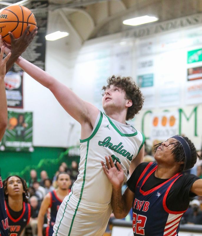 Choctaws Camry Johnson reaches for a rebound during the Choctaw Fort Walton Beach boys basketball game at Choctaw.
