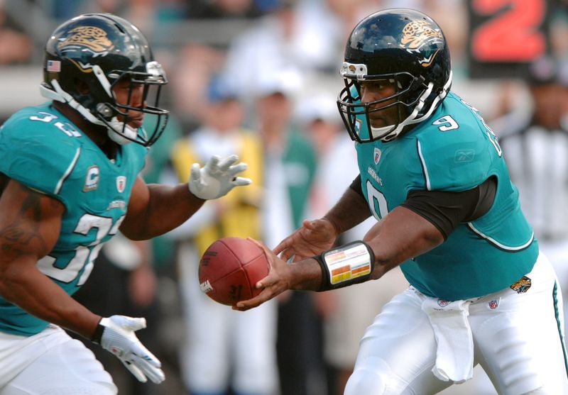 Jaguars quarterback David Garrard (9) hands off to running back Maurice Jones-Drew (32) in the first quarter against the Miami Dolphins on Sunday, December 13, 2009.