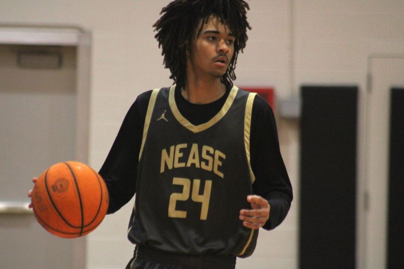 Nease guard Camden Cooper (24) dribbles against Bishop Kenny during a high school boys basketball game on Jan. 13, 2026. [Clayton Freeman/Florida Times-Union]