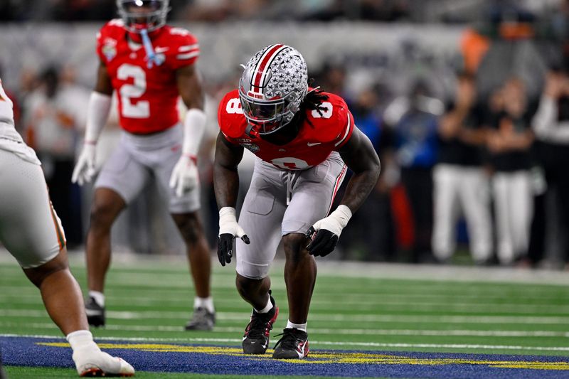 Dec 31, 2025; Arlington, TX, USA; Ohio State Buckeyes linebacker Arvell Reese (8) gets into position during the 2025 Cotton Bowl and quarterfinal game of the College Football Playoff at AT&T Stadium.