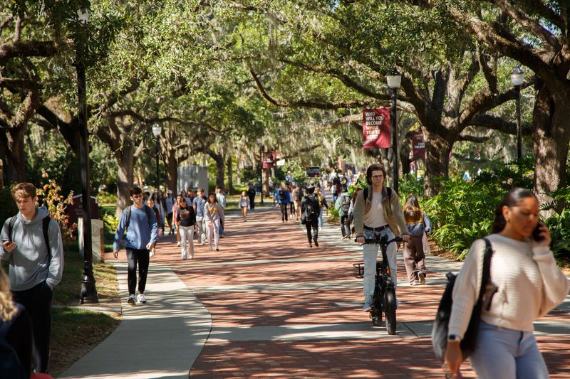 Florida State University students make their way along Legacy Walk, one of the campus’ signature pathways.