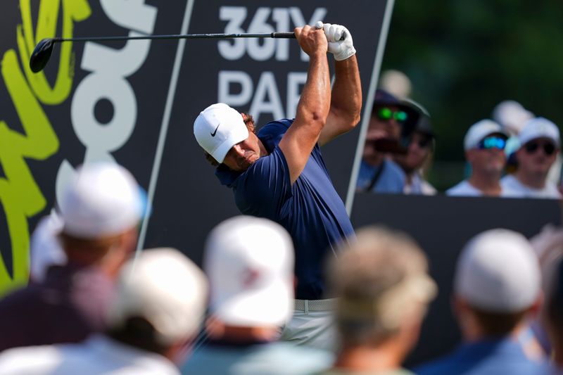 Aug 22, 2025; Detroit, Michigan, USA; Brooks Koepka of Smash GC plays his shot from the fifth tee during the quarterfinals of the LIV Golf Michigan Team Championship at The Cardinal at Saint John's Resort. Mandatory Credit: Aaron Doster-Imagn Images