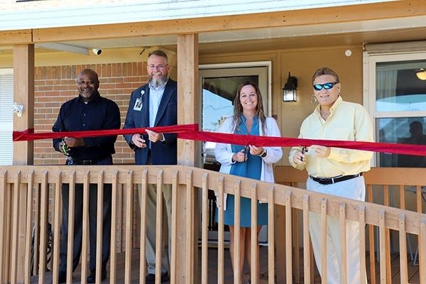 Escambia County, Waterfront Mission celebrate LifeBuilder Recovery homes.