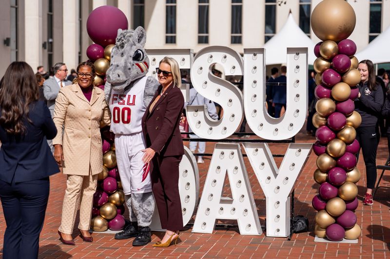 People gather in the Florida capitol courtyard to celebrate FSU Day as the Marching Chiefs perform, Wednesday, Jan. 21, 2025.