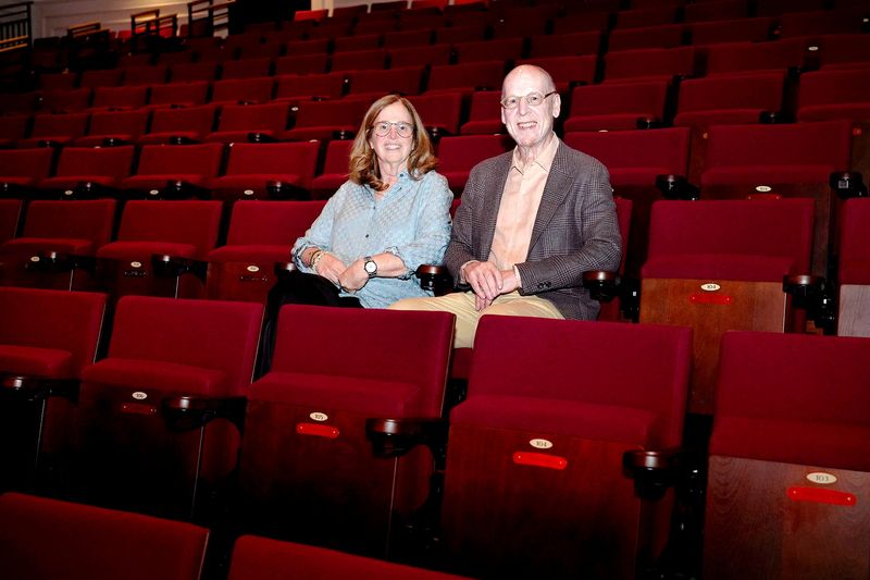 Jill and Avram “Avie” Glazer are seated in the Man Hall, a 400-seat jewel box theater on Jan. 22, before the first evening performance in of Inaugural Season of Glazer Hall, formerly the Royal Poinciana Playhouse, in the Royal Poinciana Plaza.