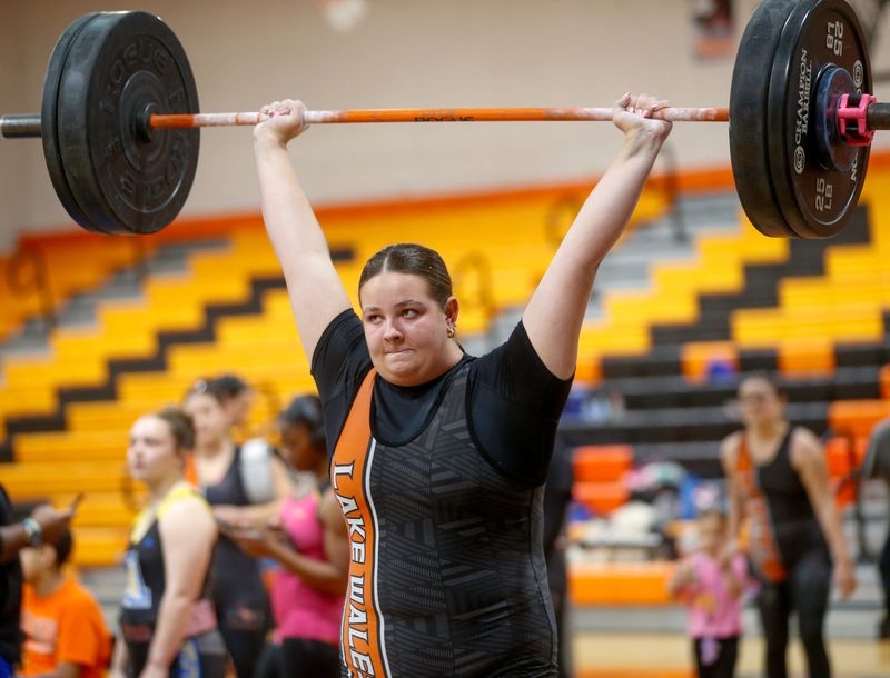 Lake Wales' Abby Childress competes at unlimited on Saturday at the Class 2A, District 11 girls weightlifting competition at Lake Wales High School.