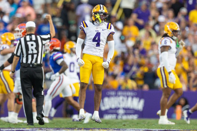 Sep 13, 2025; Baton Rouge, Louisiana, USA; LSU Tigers cornerback Mansoor Delane (4) reacts to Florida Gators quarterback DJ Lagway (not pictured) making an incomplete pass during the first half at Tiger Stadium. Mandatory Credit: Stephen Lew-Imagn Images