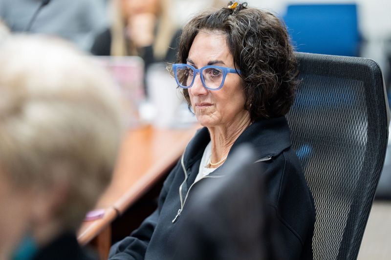 Leon County Schools Board member Laurie Lawson Cox reviews data regarding enrollment throughout the county during the LCSB retreat on Monday, Jan. 26, 2026.