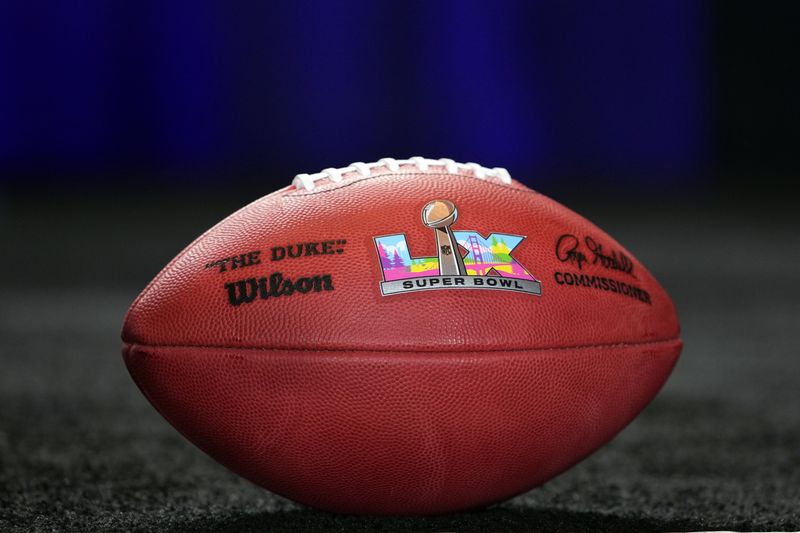 A Wilson official NFL Duke football with the Super Bowl LX (60) logo at the Super Bowl LIX host committee handoff press conference.