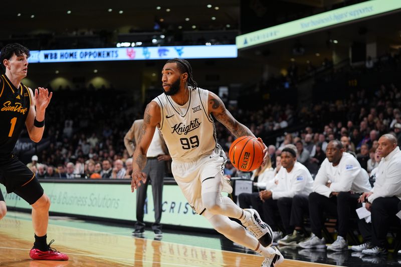 Jordan Burks (99) gave UCF the lead for good, knocking down the game-winning 3-pointer with 34 seconds left against Arizona State on Tuesday, Jan. 27, 2026.