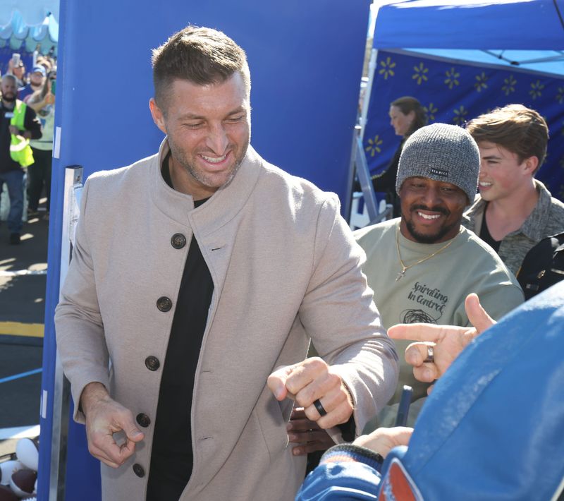 Former University of Florida football player and Heisman Trophy winner Tim Tebow makes a guest appearance on Jan. 28, 2026, at the grand opening for the Walmart Neighborhood Market at 3535 SE Maricamp Road in Ocala.