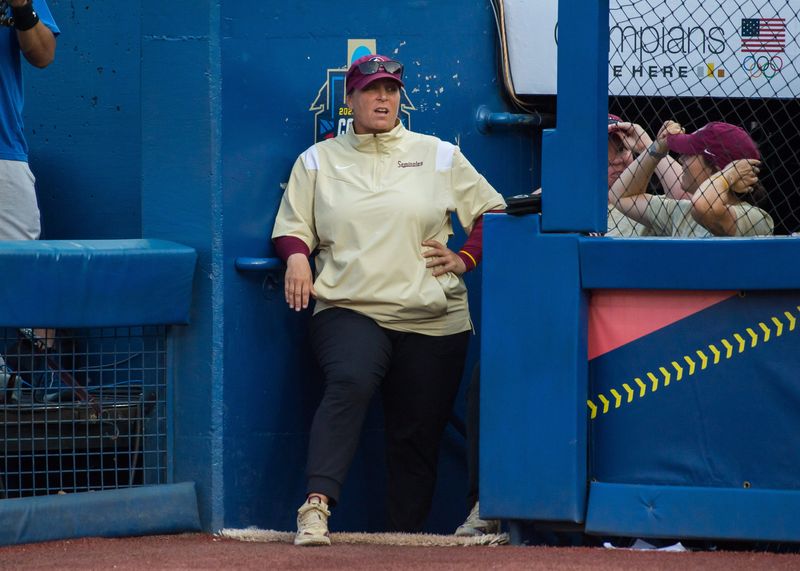 Jun 5, 2023; Oklahoma City, OK, USA; Florida State Seminoles head coach Lonni Alameda looks on from the dugout in the sixth inning against the Tennessee Lady Vols during the semifinal game at OGE Energy Field at the USA Softball Hall of Fame Complex. Mandatory Credit: Brett Rojo-USA TODAY Sports
