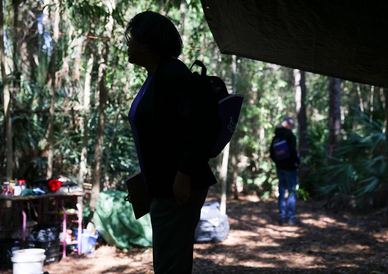 Rhoshanda Jones, of the Treasure Coast Homeless Services Council, searches for people experiencing homelessness for the annual point-in-time (PIT) count, Jan. 29, 2026, in Martin County. The Department of Housing and Urban Development mandates that each community count its homeless populations on only one day each year to determine how much funding they need.
