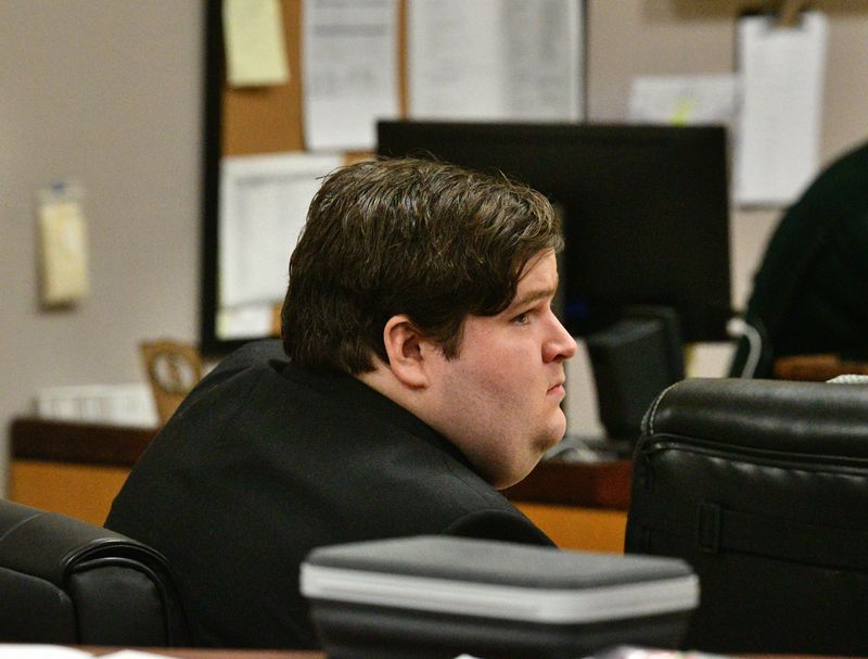 Former Deputy Andrew Lawson sits in court on Jan. 30 before withdrawing his guilty plea on Jan. 30 after Circuit Judge Michelle Naberhaus said she would not sentence him under the guidelines agreed upon. Lawson, who shot and killed roommate and fellow deputy Austin Walsh, said the shooting was accidental.