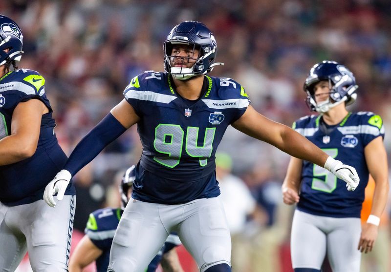 Sep 25, 2025; Glendale, Arizona, USA; Seattle Seahawks defensive end Mike Morris (94) against the Arizona Cardinals at State Farm Stadium. Mandatory Credit: Mark J. Rebilas-Imagn Images
