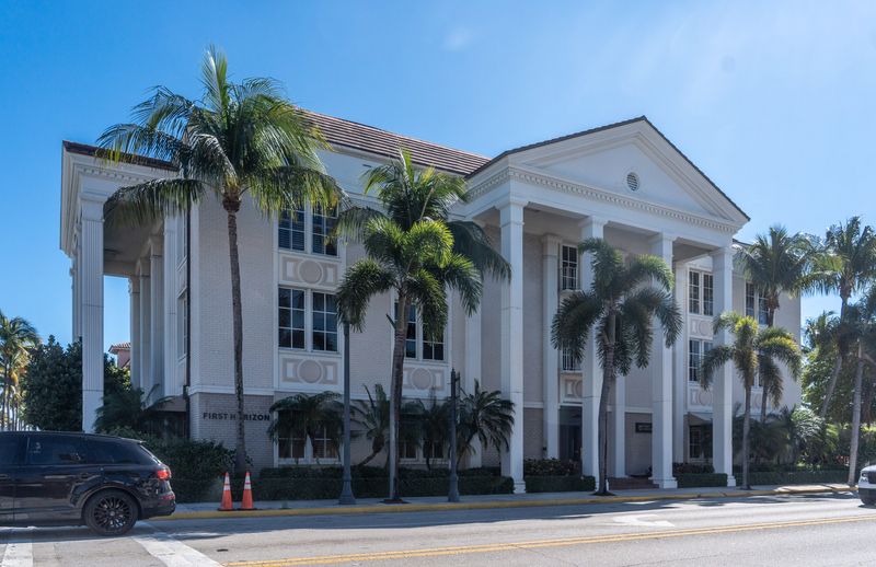 The bank building at 180 Royal Palm Way is seen in this photo from February. The building is one of two commercial properties and three parking lots that were part of a sale from entities affiliated with the Frisbie Group to CS Ventures.
