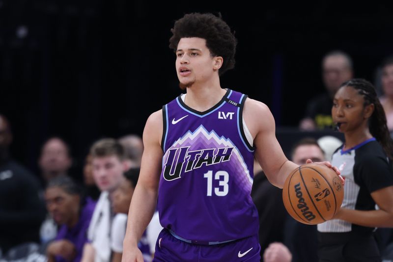 Jan 30, 2026; Salt Lake City, Utah, USA; Utah Jazz guard Walter Clayton Jr. (13) dribbles against the Brooklyn Nets during the first half at Delta Center. Mandatory Credit: Rob Gray-Imagn Images