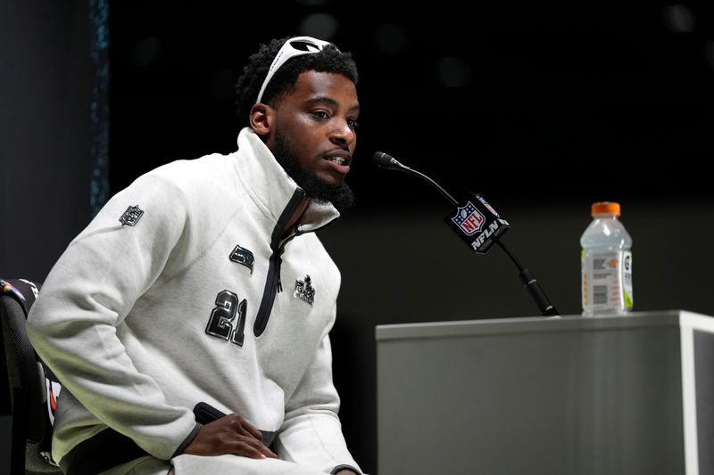 Feb 2, 2026; San Jose, CA, USA; Seattle Seahawks cornerback Devon Witherspoon (21) speaks to media during Opening Night for Super Bowl LX at San Jose Convention Center. Mandatory Credit: Kyle Terada-Imagn Images