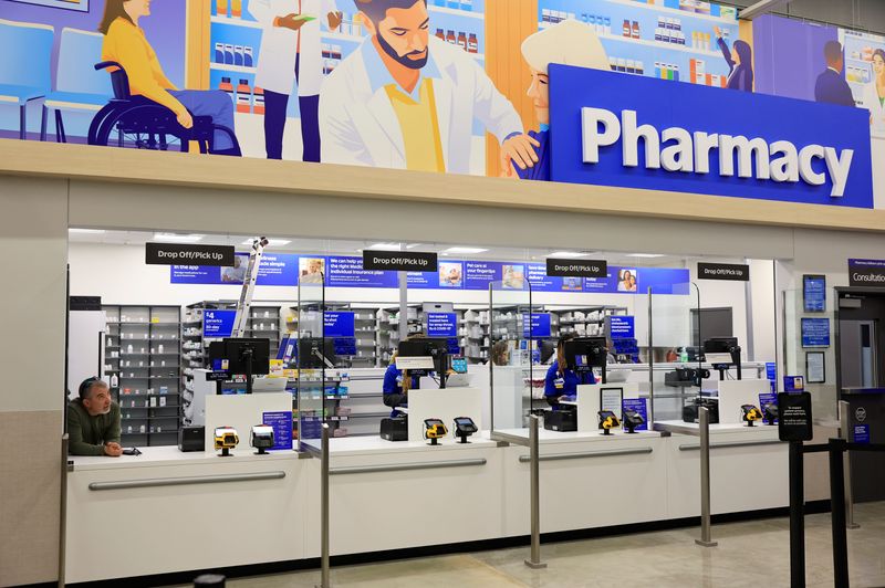 Tony Verzi, superintendent and general contractor for a new Walmart in Jacksonville, looks on from the pharmacy area during a media tour in February.