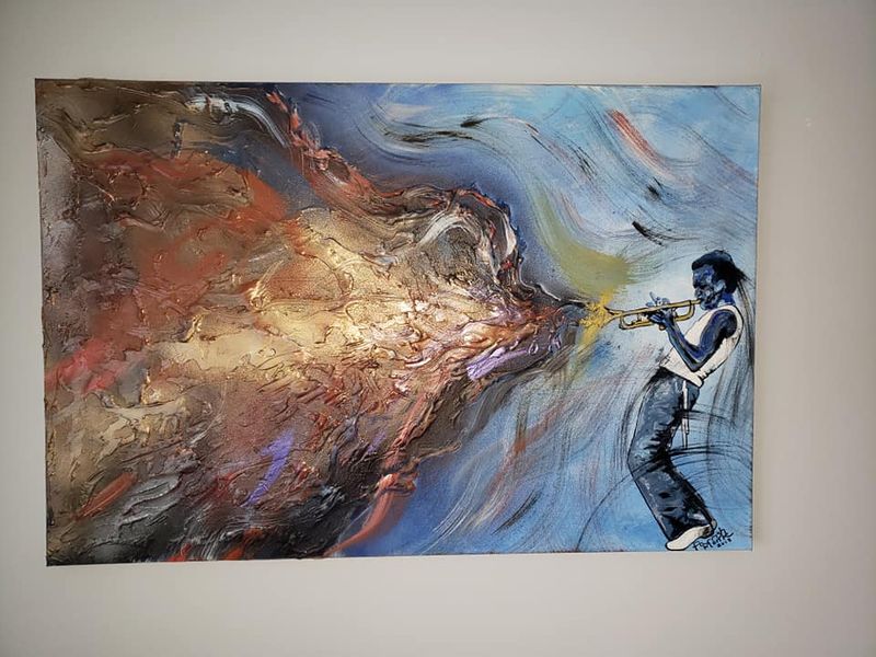 A painting interpreting the colorful, fiery sounds of Miles Davis by Parrish Monk.