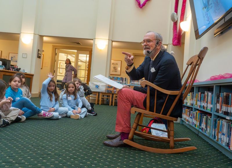 Author Robert L. Forbes interacts with students from Palm Beach Public elementary school visiting the Society of the Four Arts Children's Library on a field trip on Feb. 4.