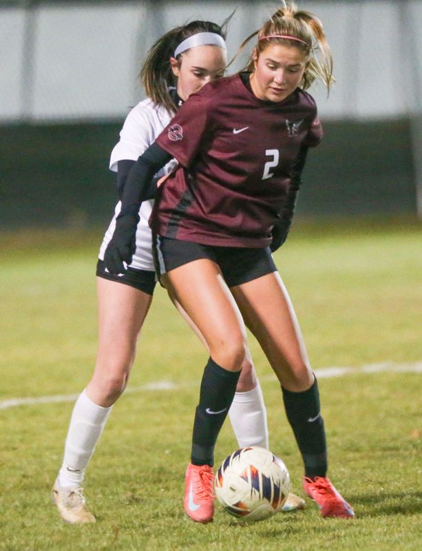 Niceville Delaney Diehl keeps a Navarre player from the ball during the Niceville Navarre girls regional quarterfinal soccer match at Niceville.