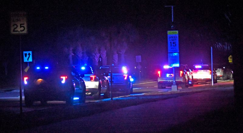 Law enforcement vehicles lined up along the west side of Viera Charter School on Friday evening, Feb.6.