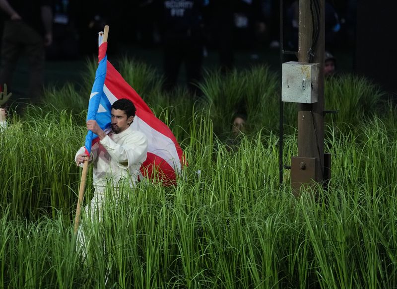 Recording artist Bad Bunny performs at halftime in Super Bowl LX between the New England Patriots and the Seattle Seahawks at Levi's Stadium.