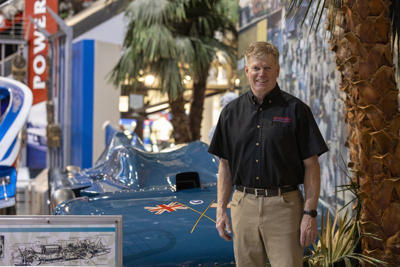 Daren Lucas, with Sir Malcolm Campbell's Bluebird behind him, is the third president in the 37-year history of the Motorsports Hall of Fame of America.