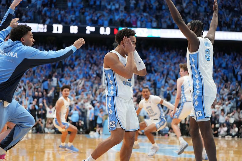 Feb 7, 2026; Chapel Hill, North Carolina, USA; North Carolina Tar Heels guard Seth Trimble (7) and teammates react after hitting the game winning shot in the second half at Dean E. Smith Center. Mandatory Credit: Bob Donnan-Imagn Images