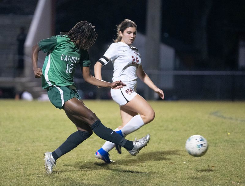 Crusaders Addison Manning (12) takes a shot on goal against the Seminoles during the Florida State University High vs Pensacola Catholic girls soccer 3A Regional Semifinal game at Pensacola Catholic High School on Feb. 9, 2026.
