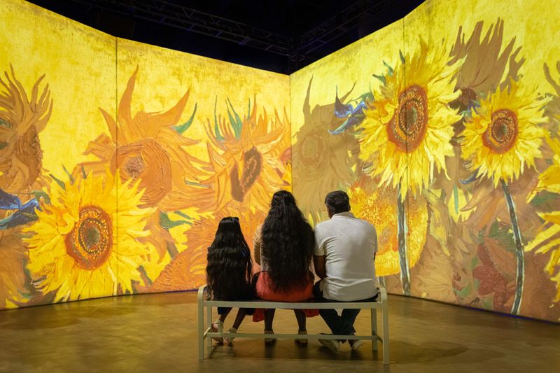 Van Gogh's "Sunflowers" surround visitors in the touring show “Beyond Van Gogh and Beyond Monet: The Immersive Experience.” The show visits Estero's Coconut Point from Feb. 13 to March 29.