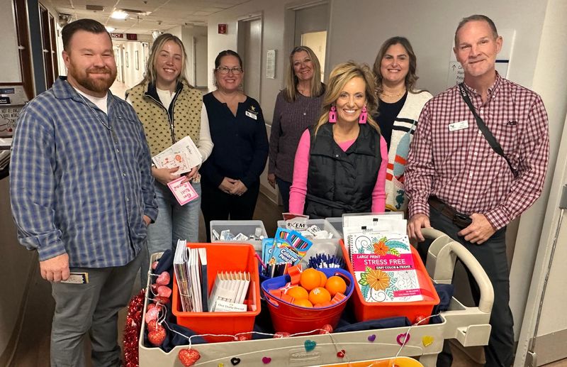 Members of Leadership Englewood recently visited patients at Englewood Hospital with a comfort cart and delivered get-well cards from art students at Lemon Bay High School.