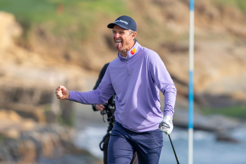 February 2, 2025; Pebble Beach, California, USA; Justin Rose celebrates making an eagle on the 18th hole during the final round of the AT&T Pebble Beach Pro-Am golf tournament at Pebble Beach Golf Links. Mandatory Credit: Kyle Terada-Imagn Images