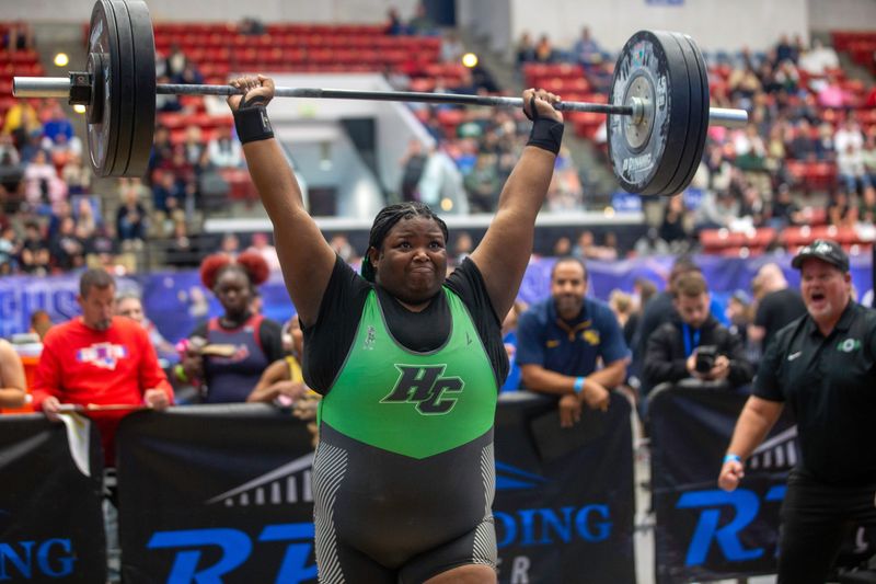 Haines City senior Divineya Smith completes her lift of 200 pounds in the clean and jerk in the Unlimited weight class on Wednesday at the 2026 FHSAA Girls Weightlifting State Championships at the RP Funding Center. She went on to win the Unlmited state title in Traditional.